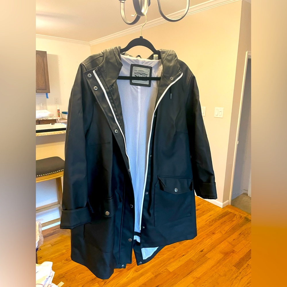 Black Levi’s raincoat.
